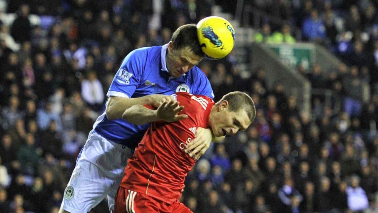 Gary Caldwell playing for Wigan Athletic against Liverpool
