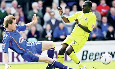 Gavin Cowan powers into a challenge in his Shrewsbury Town playing days in 2005