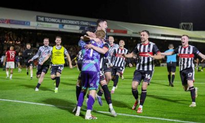 Grimsby Town celebrate knocking Manchester United out of the Carabao Cup