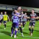 Grimsby Town celebrate knocking Manchester United out of the Carabao Cup