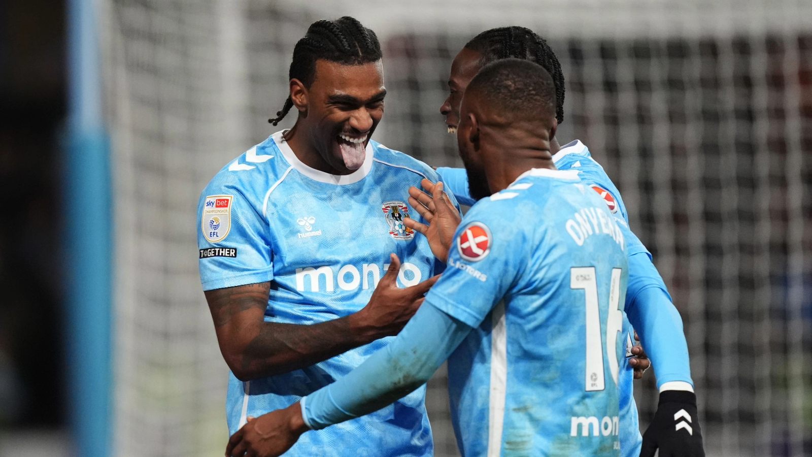 Haji Wright celebrates