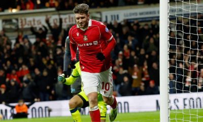Josh Windass celebrates his decisive goal for Wrexham