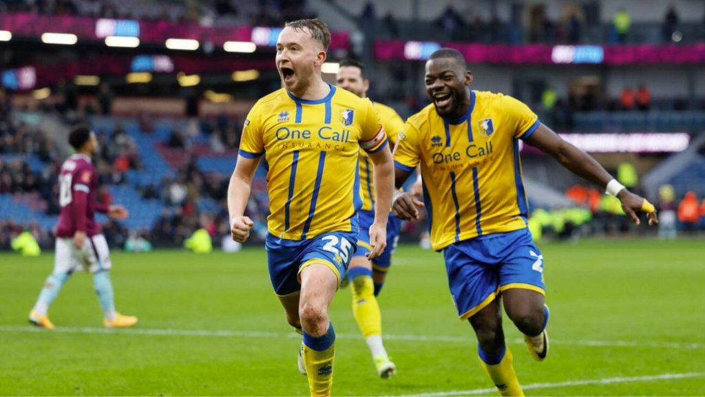 Mansfield Town’s Louis Reed celebrates his stunning winner against Burnley in the FA Cup fourth round