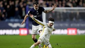 Millwall’s Tristan Crama and Sheffield United’s Callum O’Hare battle for the ball