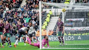 Patrick Agyemang wheels away after doubling Derby County’s lead
