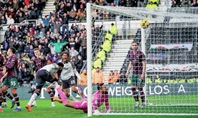 Patrick Agyemang wheels away after doubling Derby County’s lead