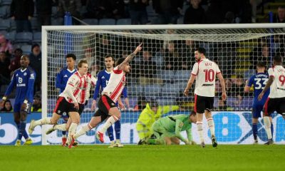 Ryan Manning (centre) celebrates