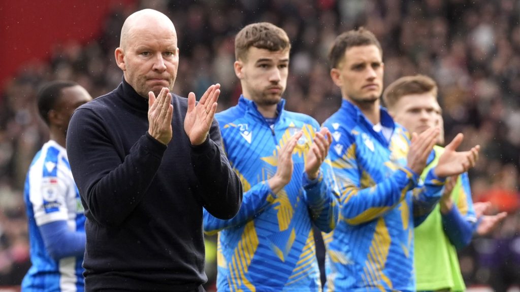 Henrik Pedersen and his players applaud the Sheffield Wednesday fans