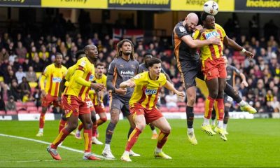 Watford’s Jeremy Ngakia, right, wins an aerial duel against Derby County’s Matt Clarke