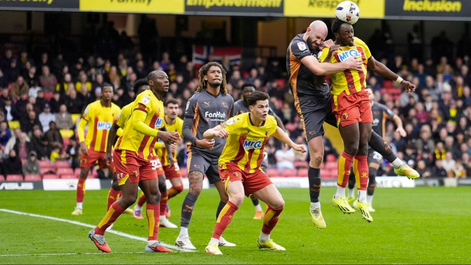 Watford’s Jeremy Ngakia, right, wins an aerial duel against Derby County’s Matt Clarke