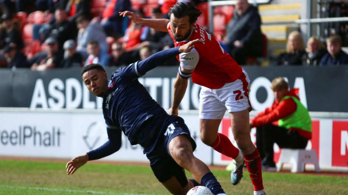 Bolton Wanderers’ Ethan Erhahon tackles Rotherham United skipper Joe Rafferty