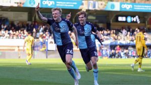 Wycombe Wanderers’ Connor Taylor celebrates scoring the second