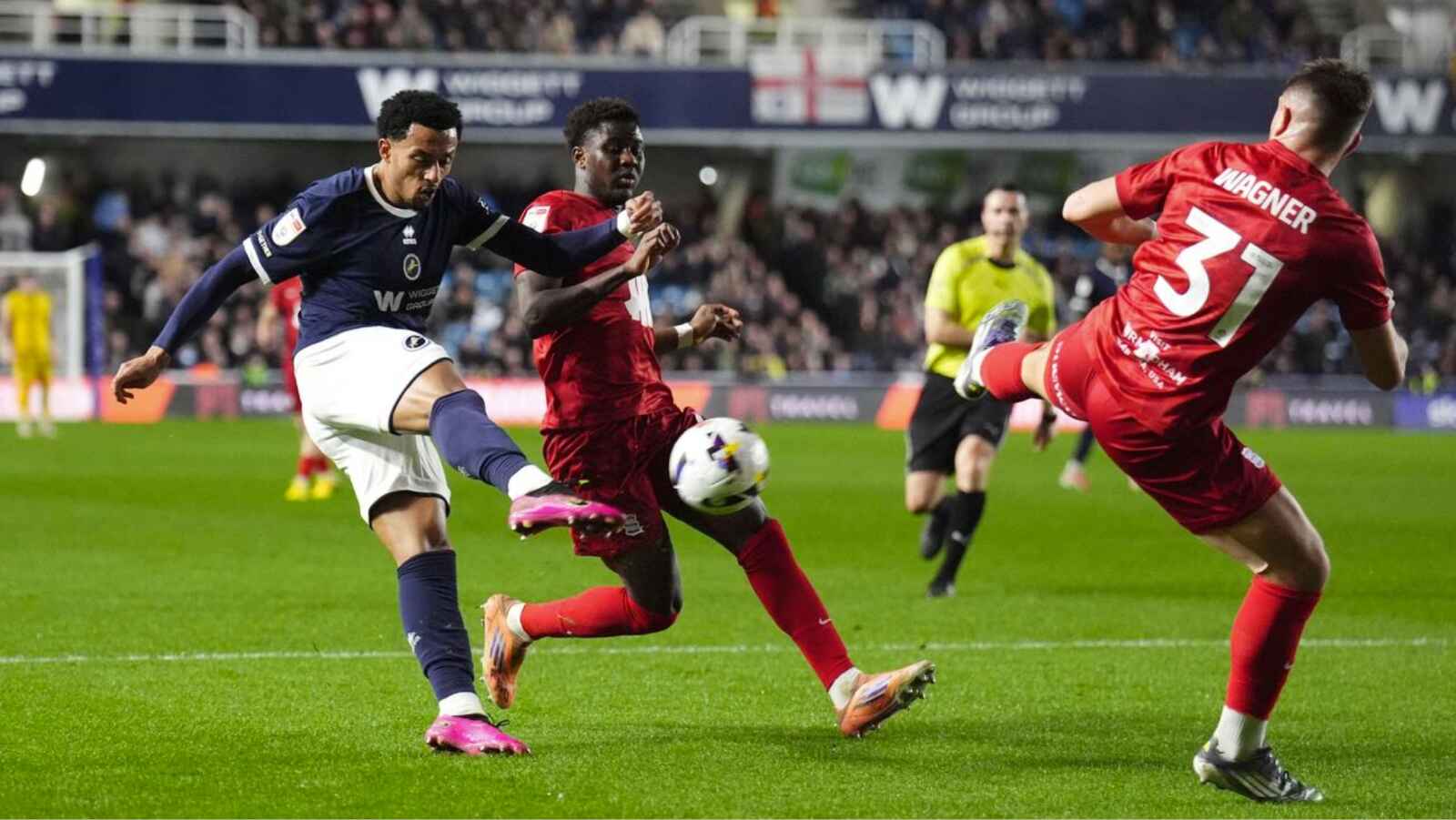Millwall’s Femi Azeez volleys home the opener against Birmingham on Wednesday