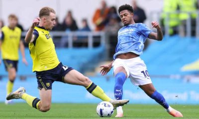 Oxford United’s Jack Currie tackles Derby County’s Rhian Brewster