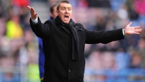 Lee Clark, pictured, in his first managerial job with Huddersfield Town