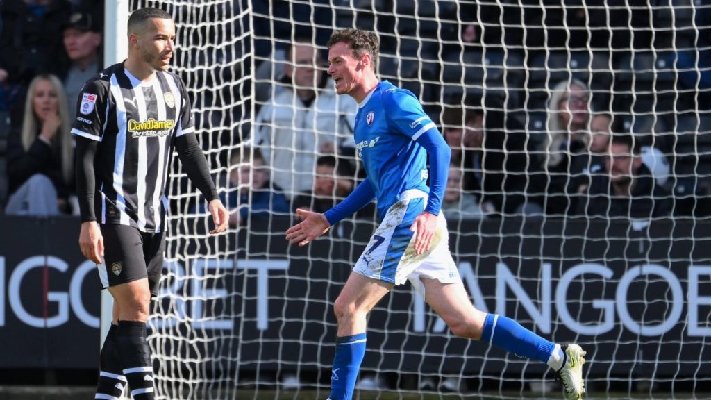 Chesterfield&rsquo;s Liam Mandeville wheels away after his winning goal