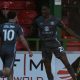 Milton Keynes Dons’ Marvin Ekpiteta celebrates scoring his side’s second with Aaron Collins