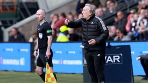 Neil Warnock giving instructions on the touchline