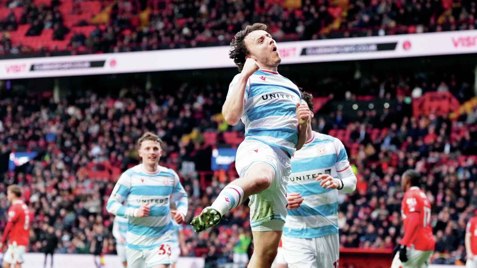 Ollie Rathbone celebrates his winner for Wrexham at Charlton Athletic last weekend