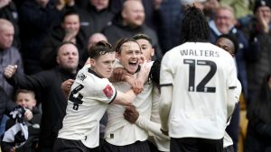 Port Vale’s Ben Waine celebrates with his team-mates after scoring