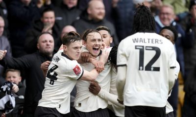 Port Vale’s Ben Waine celebrates with his team-mates after scoring