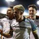 Derby County’s Sam Szmodics (centre) celebrates with team-mates