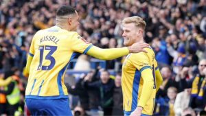 Will Evans savours his leveller for Mansfield Town against Arsenal