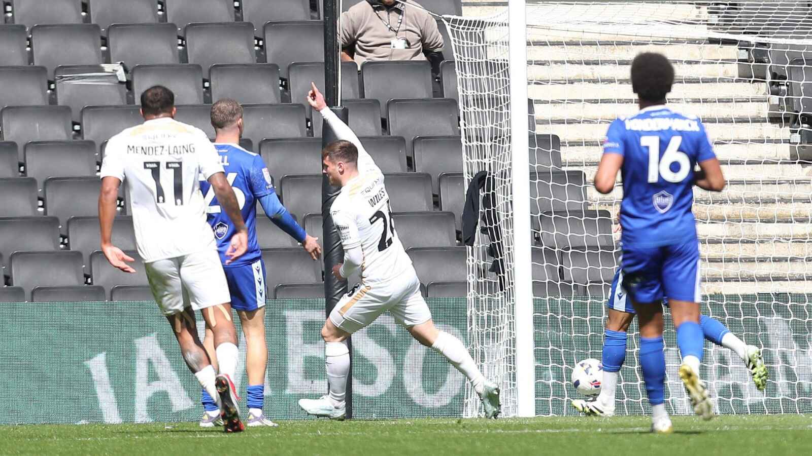 MK Dons’ Ben Wiles celebrates scoring the second
