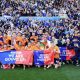 Cardiff City players and fans savour promotion back to the second tier