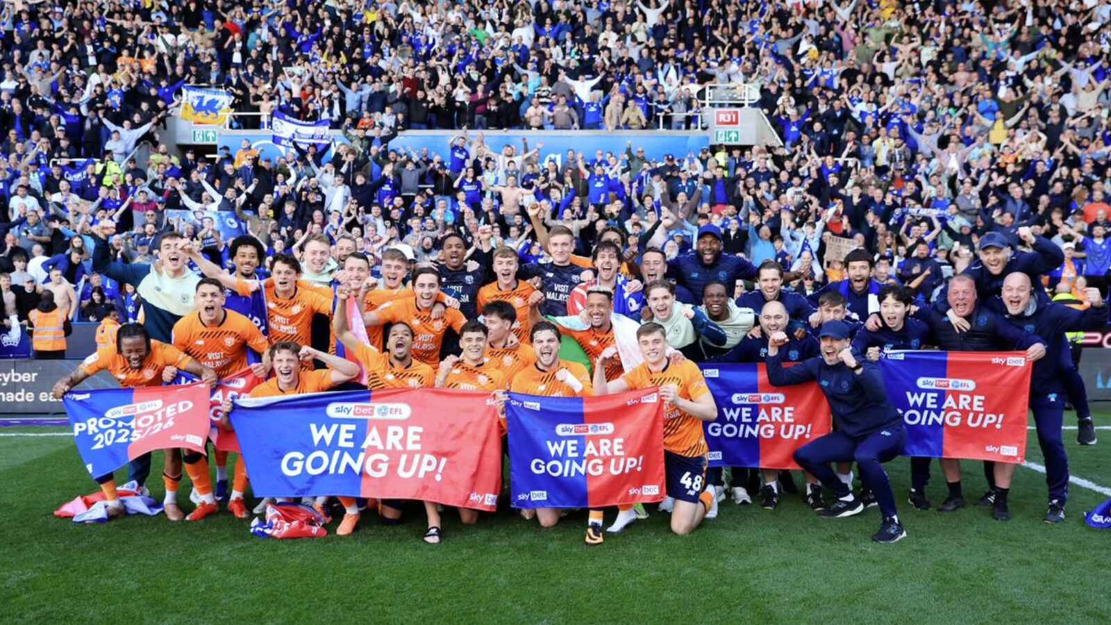 Cardiff City players and fans savour promotion back to the second tier