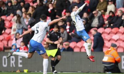 Portsmouth’s Conor Chaplin enjoys his winner with the travelling supporters