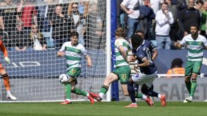 Derek Mazou-Sacko scores Millwall’s opener