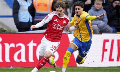 Mansfield Town’s George Abbott, right, battles with Arsenal whizz-kid Max Dowman in the FA Cup