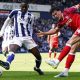 Ipswich Town’s Jacob Greaves, right, shoots under pressure from West Bromwich Albion’s Ousmane Diakite