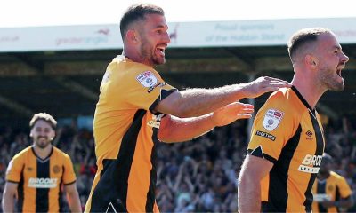 James Gibbons celebrates scoring Cambridge United’s second goal