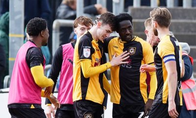 Joe Thomas of Newport County, centre, celebrates his goal with team-mates