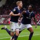 Josh Coburn, left, celebrates his winner for Millwall at former club Middlesbrough