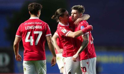 Josh Windass, right, is congratulated after scoring Wrexham’s winner at Oxford United