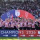 Lincoln City’s players lift the League One trophy