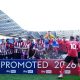 Lincoln City sealed promotion to the Championship with victory at Reading