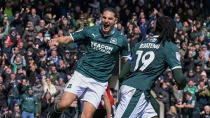 Lorent Tolaj, left, celebrates Malachi Boateng’s late leveller for Plymouth Argyle
