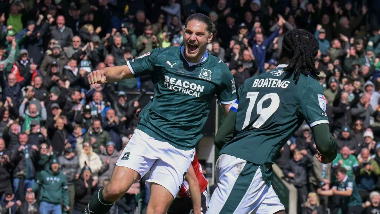 Lorent Tolaj, left, celebrates Malachi Boateng’s late leveller for Plymouth Argyle
