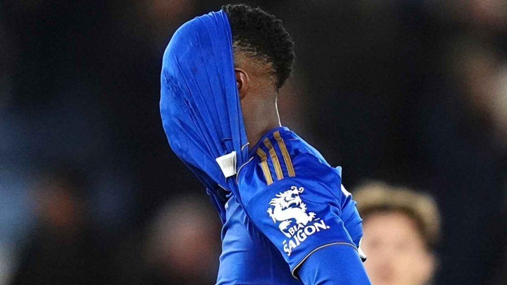 Leicester City striker Patson Daka with his shirt over his head at full-time