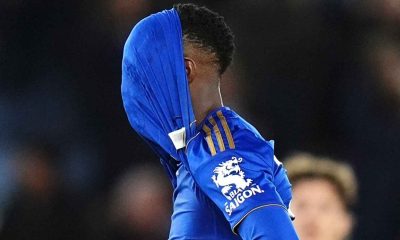 Leicester City striker Patson Daka with his shirt over his head at full-time