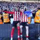 Lincoln City's Reeco Hackett, left, and Dom Jefferies celebrate promotion