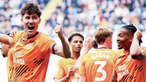 Rubin Colwill, left, celebrates scoring Cardiff City’s opener