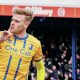 Will Evans celebrates his equaliser for Mansfield Town against Arsenal in the FA Cup