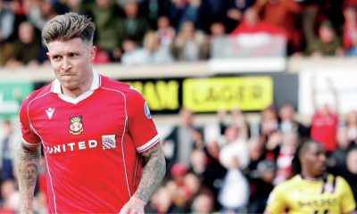 Josh Windass wheels away after scoring Wrexham’s second