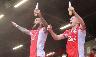 Crawley Town’s Jay Williams, left, and Jonny Russell celebrate staying up