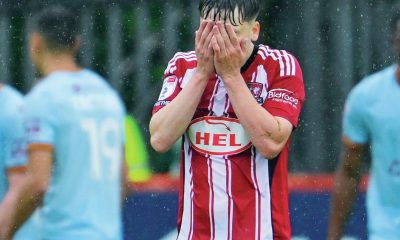Exeter City’s Liam Oakes looks dejected after conceding